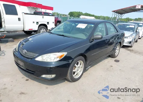 2003 Toyota Camry Xle z USA, uszkodzony, nr VIN 4T1BE30KX3U197331